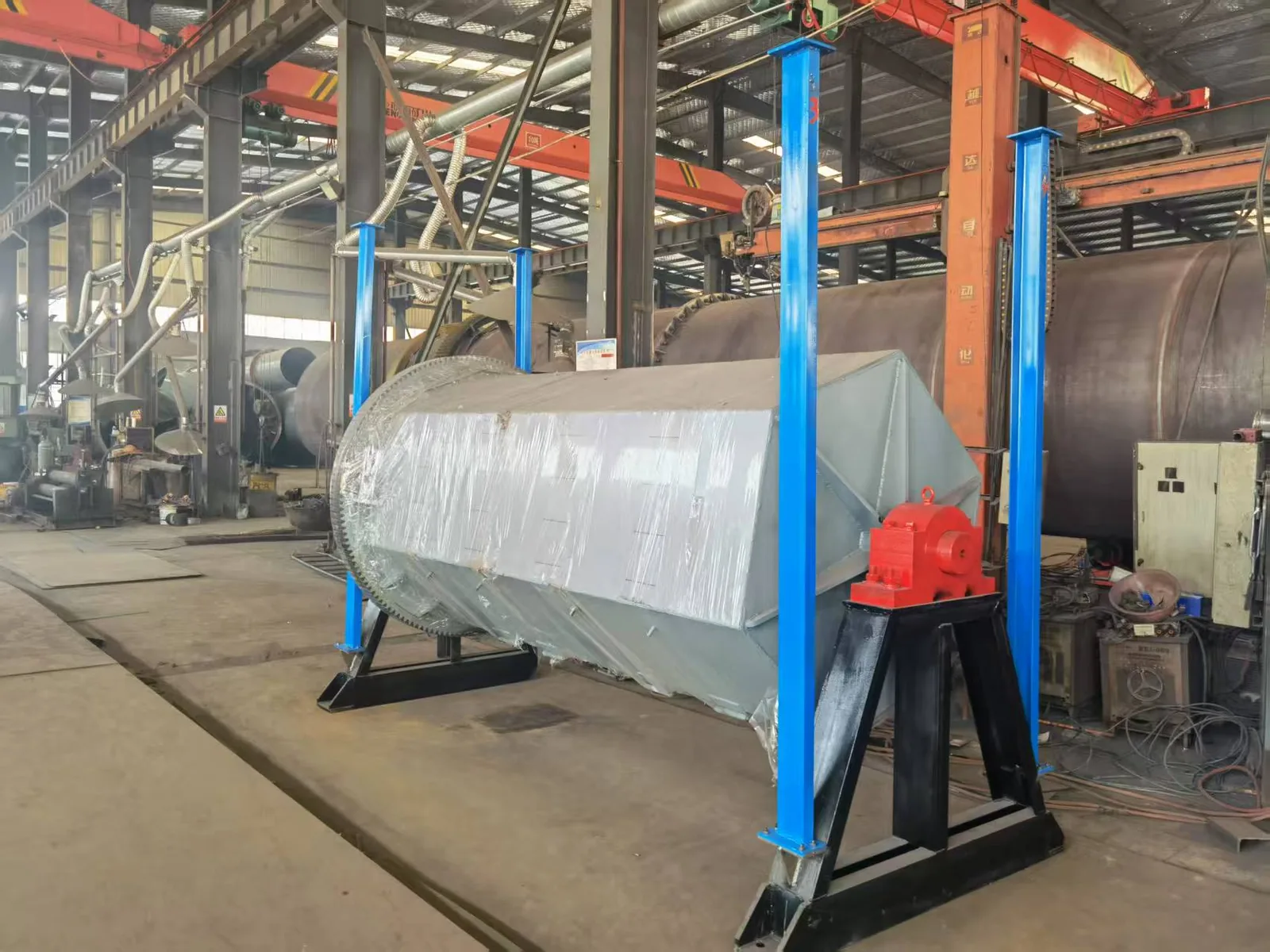 Large industrial stone finishing equipment on the Cronus workshop floor